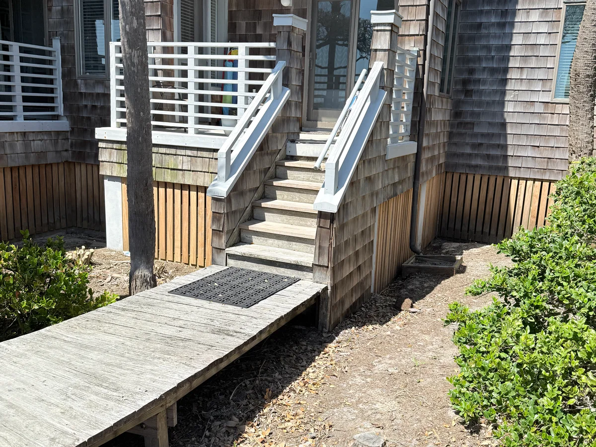 Exterior stair and access area before construction improvements